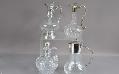 Four various claret or wine jugs