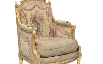 François-Claude Menant: A French Louis XVI giltwood bérgere. Signed 'F.C. Menant'. Late 18th century.