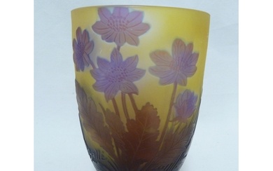Galle - a cameo glass vase decorated with blue flowers on a ...