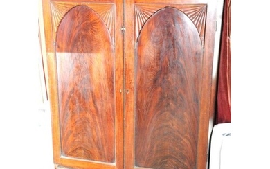 Georgian mahogany linen press with panelled doors, adjustabl...