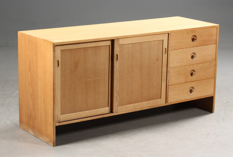 H. J. Wegner. Dresser made in veneered oakwood,...