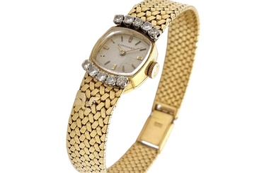 LONGINES MONTRE bracelet de dame en or jaune, la lunette encadrée de 2x5 diamants poids...