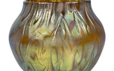 Loetz (Austrian), an iridescent Phaenomen glass vase, c.1898, PG 7499-1, ground out pontil engraved Loetz Austria, The bulbous form of amber colour decorated with gold and blue iridescent undulating bands, 11.5 cm high, 13.7 cm wide, Property from...