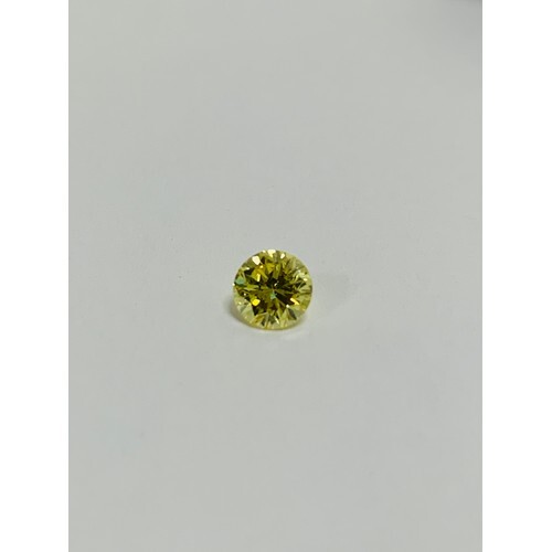 Loose diamond ,0.60ct fancy intense yellow brilliant cut dia...