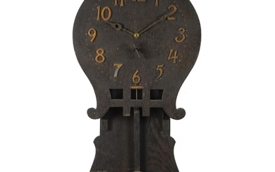 Oak Arts & Crafts drop dial wall clock having applied gilt p...