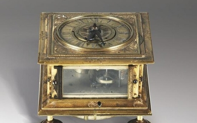 Orologio a saliera in bronzo dorato con quadrante