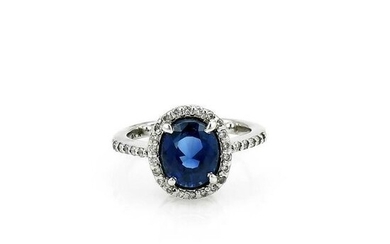 Oval Blue Sapphire and Diamond Halo Ring 18K White Gold