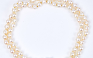 PEARL NECKLACE, double row, cultured saltwater pearls, clasp in 14k white gold with 11 diamonds in the clasp, second half of the 20th century.