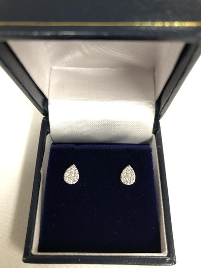 Pair Of 18ct Mounted Diamond cluster earrings