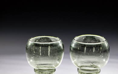 Pair of Romans Germany, 18th century Olive green glass with demolition. Raised, ...