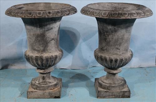 Pair of cast iron urns, 17 in. T, 13 in. Dia.