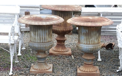 Pair of large antique French cast iron fluted garden urns, w...