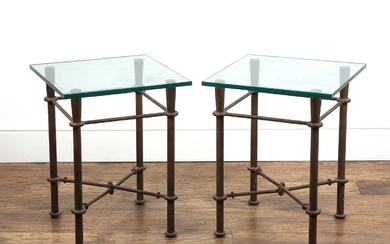 Pair of side or occasional tables standing on decorative meta...