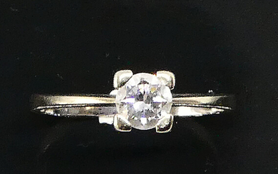 RING in white gold set with a solitaire diamond calibrating about 0.25 cts. Eagle's head punch. Gross weight 2.03 g TDD 55