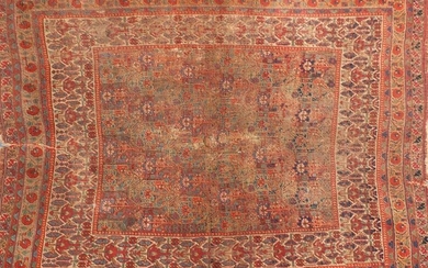 Rectangular Persian rug having an all over repeat