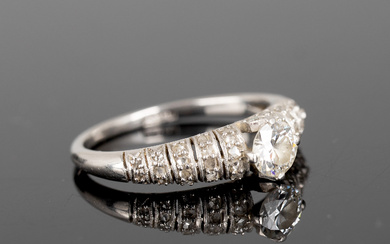 Ring with diamonds.