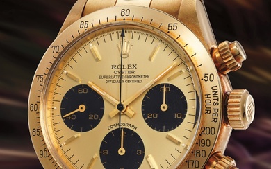 Rolex, Ref. 6265 A rare and attractive yellow gold chronograph wristwatch with champagne dial, bracelet, caseback sticker, additional black service dial, guarantee and presentation box