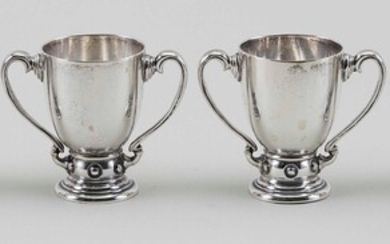 SIX STERLING SILVER MINIATURE TROPHIES