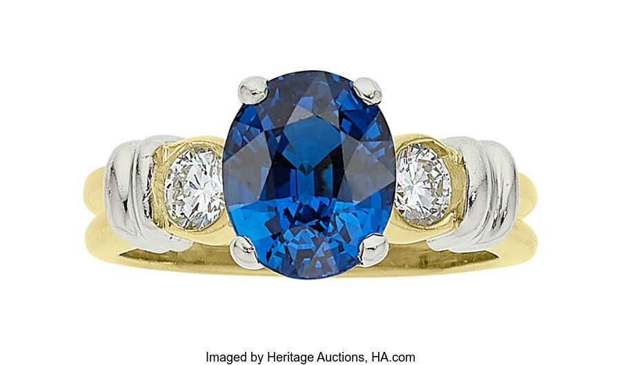 Sapphire, Diamond, Platinum, Gold Ring Stones: Oval-shaped sapphire weighing...