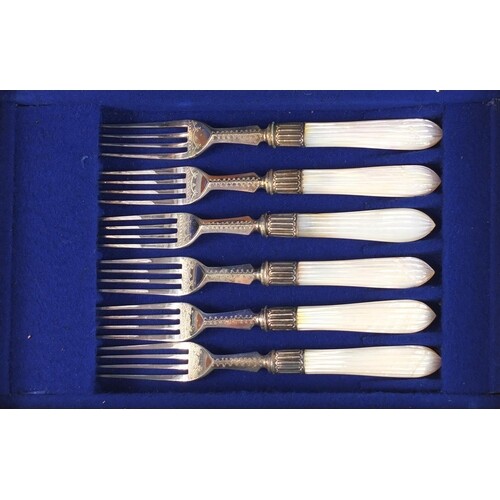 Set of six silver plated cake knives and forks with mother o...