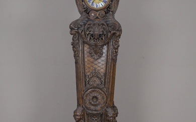 Spectaculaire pendule de parquet Fin du XIXe siècle En chêne richement sculpté de coquilles, rinceaux...