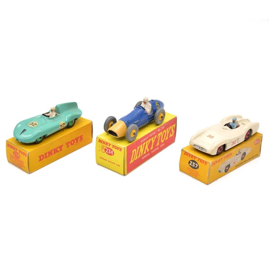 Three Dinky Toys die-cast models, including Ferrari Racing Car etc