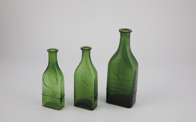 Three bottles of Germany, 20th century Green glass with embossed inscription: ''...