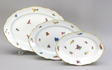 Three oval serving plates