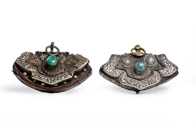 Two Tibetan silver mounted leather pouches 18th/19th Century Comprising a pouch mounted...