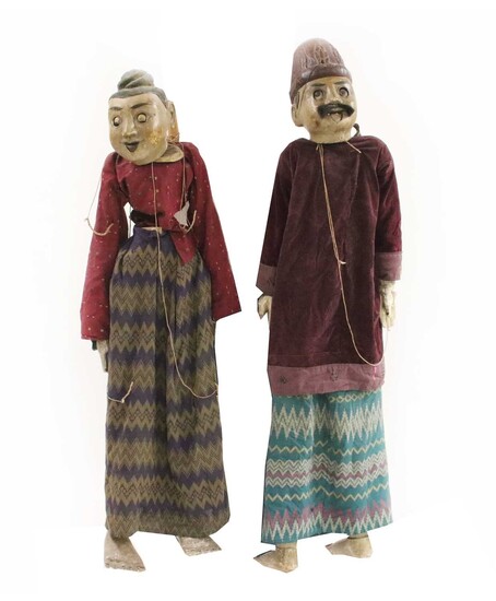 Two life-sized Burmese carved and painted wooden puppets