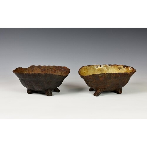 Two novelty Victorian cast iron dog bowls fashioned as inver...