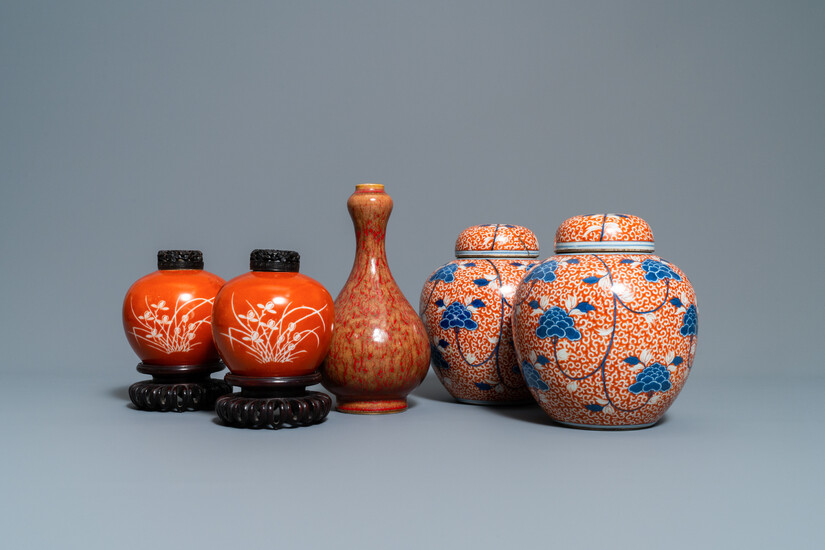 Two pairs of Chinese coral-ground jars and a flambé-glazed bottle vase, 19/20th C.