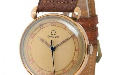 Vintage OMEGA watch for men/Unisex. In 18kt yellow gold. Circular case with Arabic numerals.