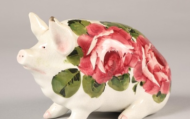 Wemyss ware pig, hand painted with cabbage rose decoration, ...