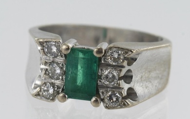 White gold (tests 18ct) diamond and emerald ring, one baguet...