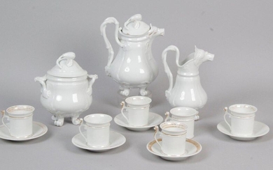 White porcelain tea service with gold edging, including a teapot, a milk jug, a covered sugar bowl, six cups and five saucers. Paris XIX century. (gilding wears on a chipped saucer and a restored handle).