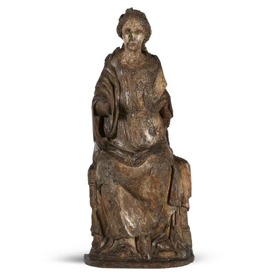 Wooden sculpture depicting the Madonna on the throne