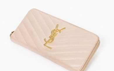 Yves Saint Laurent: A wallet of light pink chevron leather with gold tone hardware and one zipped compartment with five pockets. – Bruun Rasmussen Auctioneers of Fine Art
