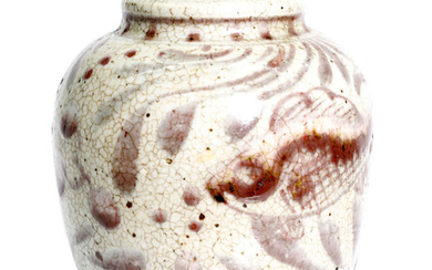 an antique, Chinese, stonewear vase with red over glaze.