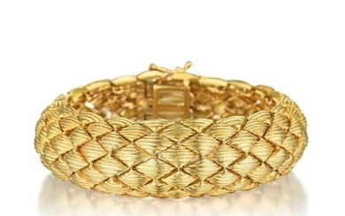 A Textured Gold Flexible Bracelet