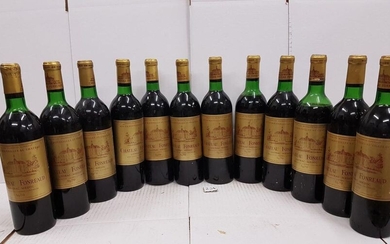 12 bottles Château FONREAUD 1970 Listrac. Impeccable labels. 3 low necks.