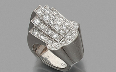 CIRCA 1935 DIAMOND RING A diamond and platinum ring. Weight...