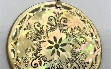 14 K YELLOW GOLD FILIGREE OVER MOTHER-OF-PEAR PENDANT.