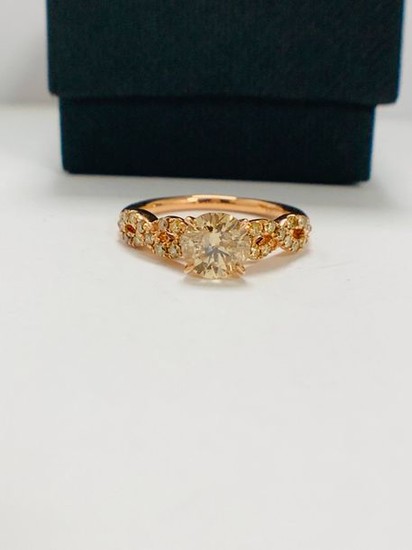 14ct Rose Gold Diamond ring featuring centre, champagne...