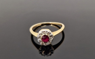 18ct gold, diamond and ruby ring set small oval ruby surroun...