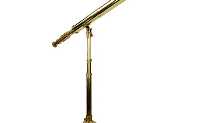 19th century brass telescope on a tripod.