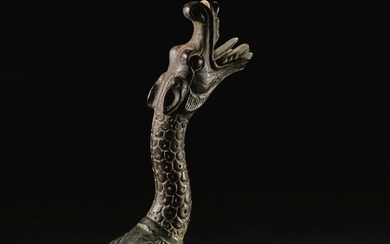 AN EXCEPTIONALLY RARE BRONZE DRAGON-FORM SUPPORT HAN DYNASTY