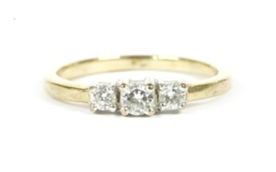 A 9ct gold three stone diamond ring