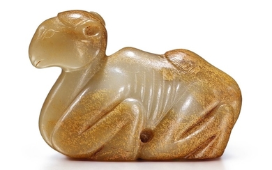 A CELADON AND RUSSET JADE CARVING OF A CAMEL TANG - MING DYNASTY