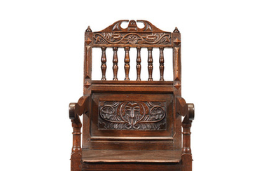 A Charles II joined oak panel and open-back armchair, Cheshire, circa 1670